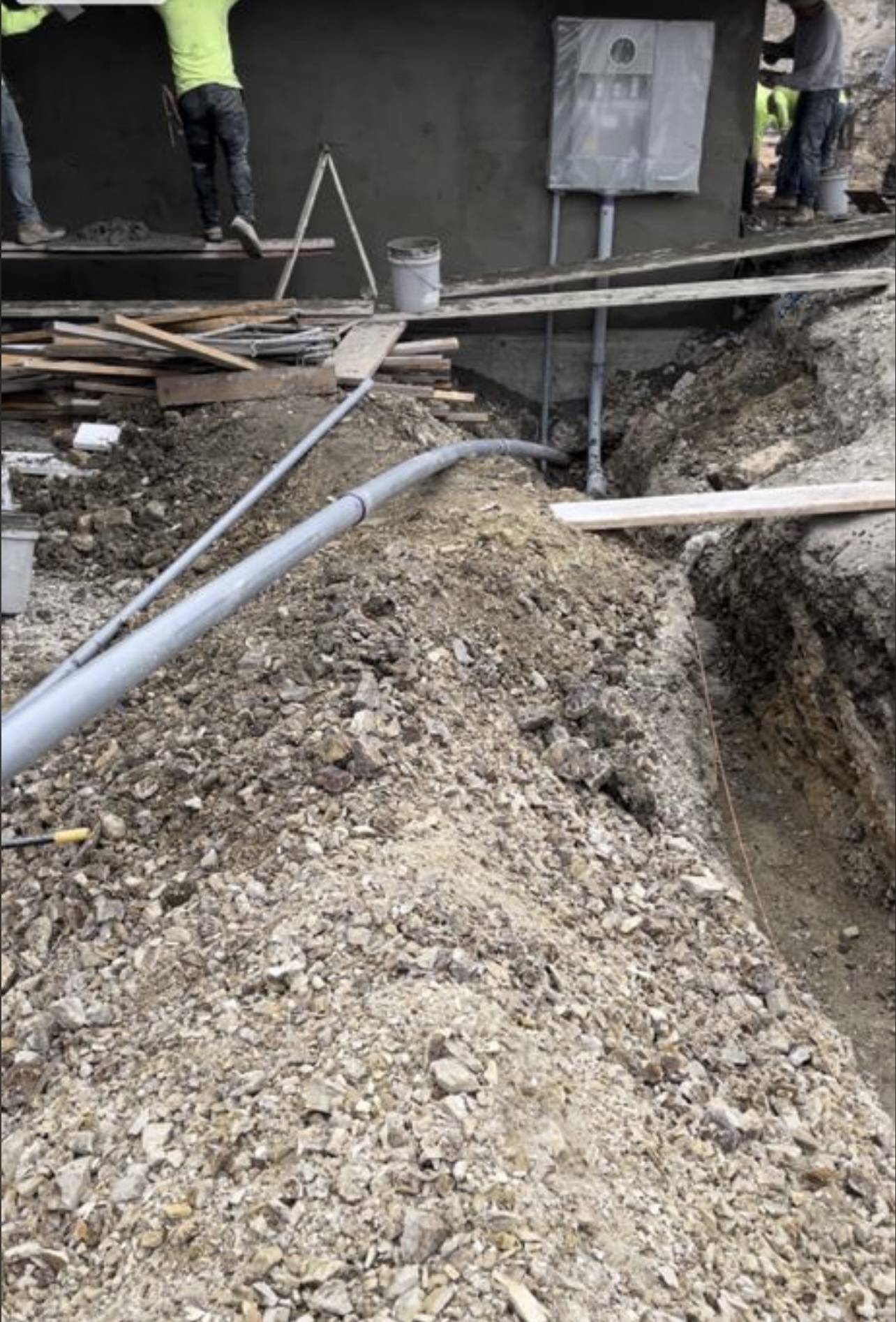 Underground trenching and service run in progress